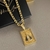 CORRENTE CADEADO 6MM + MEDALHA N.SENHORA FUNDO RAIADO 4,5x3,3CM - Versa Joias