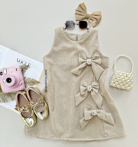 Vestido lacinho pérola