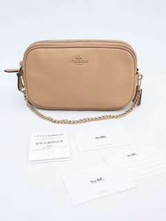 Bolsa Coach Pebble na internet