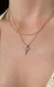 Colar Cruz Gotas Zircônias Banho de Ouro 18k - comprar online