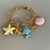 Bracelete Sereia Peixe, Concha e Estrela Canddy Com Pingentes Dourados - comprar online