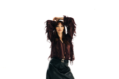 Banner de la categoría “Undone Muse”