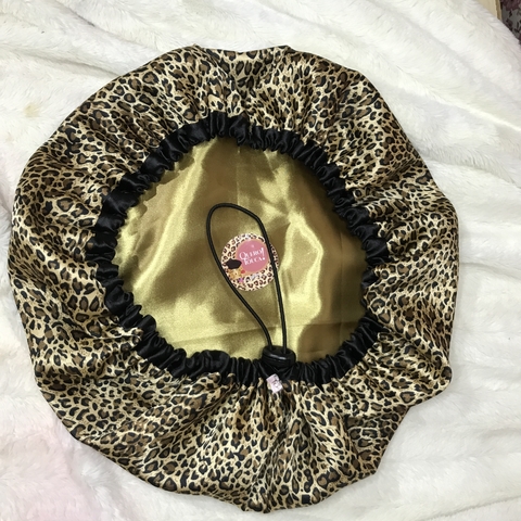 Touca dupla face estampada "oncinha"