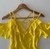 Blusa amarela na internet