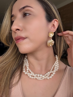 Brinco concha com aplicação de pérolas - comprar online