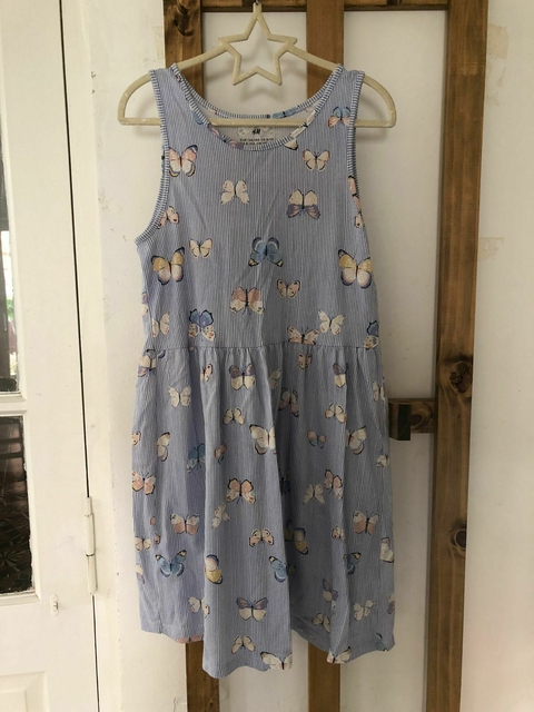 Vestido sin mangas celeste con mariposas. HYM. 8/10 años. Como nuevo.