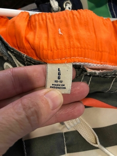 10/12A | Traje de baño con rayas y cordón en la cintura. 10/12 años. en internet