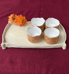 Xícara de café sem alça em cerâmica, feita à mão. na internet