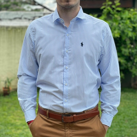 CAMISA POLO RAYADA BLANCA CON CELESTE