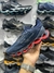 Mizuno Prophecy 14 - Marinho/Vermelho na internet