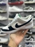 Nike Dunk Low - Cinza/Preto/Branco - Eltinho Outlet