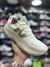 Fresh Foam" and "More Trail - Branco/Bege - Eltinho Outlet
