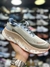 Fresh Foam" and "More Trail V3 - Bege/Laranja/Azul - Eltinho Outlet