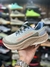 Fresh Foam" and "More Trail V3 - Bege/Laranja/Azul - comprar online