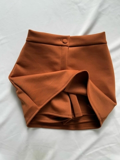 Imagem do Short saia botão encapado