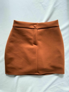 Short saia botão encapado na internet