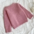 Sweater rosa con moños - primeros pasitos