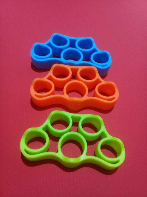 EJERCITADOR PARA DEDOS EXTENSOR (SILICONA) SET X 3 TENSIONES