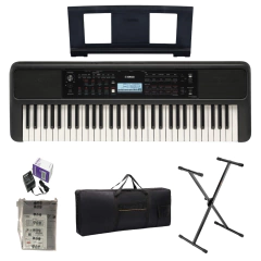 Teclado Yamaha PSR-E383 con base y estuche, incluyendo adaptador y manual de instrucciones.