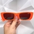 ÓCULOS DE SOL RAIO LARANJA NEON