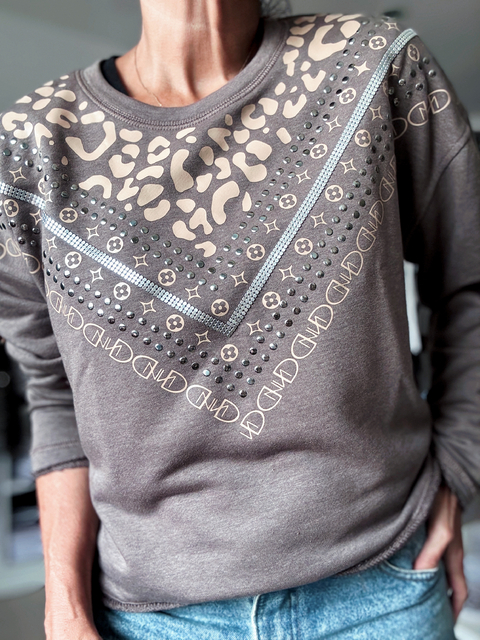 Buzo monogram/ print /tachas