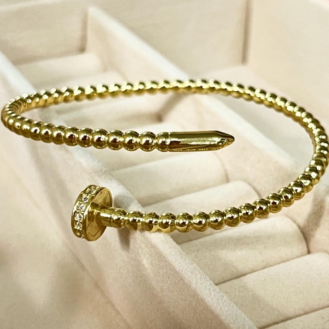 PULSERA ESCLAVA ESTILO CLAVO CART CON CUBICS ENCHAPADA ORO K2501