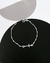 PULSEIRA BOLINHAS COM CRUZ PRATA 925 na internet