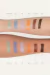 Swatches de sombra en crema en tonos verde agua, azul, lila, naranja, chocolate y negro sobre brazos.