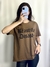 Art. M25I210 - Remera de Algodón Oversize con estampa "BEAUTIFUL DISASTER" - comprar online