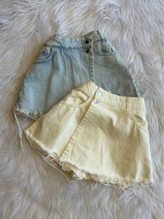 Short pollera celeste "Botón"