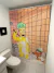 Cortina de baño Homero Simpson y Huesos