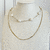 COLLAR DOBLE CON PERLAS