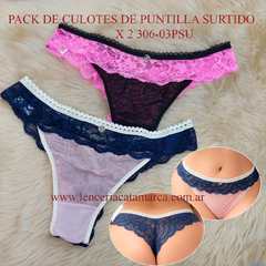 Pack de culotes de puntilla surtido en colores negro, rosa y azul marino, presentados sobre una superficie suave.