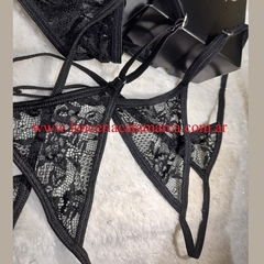 INTIMATE TANGA HILO DE ENCAJE REGULABLE NEGRO 42N