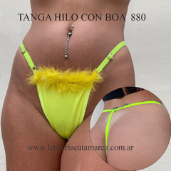 Tanga hilo regulable en color amarillo flúor, con detalle de boa de microfibra en la parte frontal.