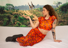 Saia tule overlock* onça laranja