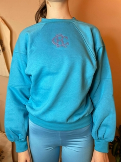 Buzo turquesa Caribbean ByRacingclub