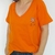 Remera Frase Frida Escote V Naranja en internet