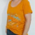 Remera Palabras Escote Redondo Naranja - Despertate