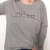 Remera Lo Que Ves Manga Larga Gris Claro en internet