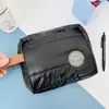 Necessaire matelasse negro brillante - comprar online