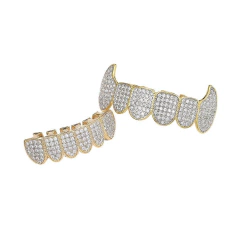 Parrilla Para Dientes Grillz Colmillos Baño de Oro 14k y Zirconias - tienda online