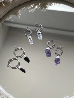 Aros energy con piedras. Baño de plata en internet