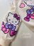 Casaco infantil Hello Kitty bege Momi H6532 na internet
