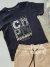 Conjunto infantil camiseta preta e bermuda bege Charpey 18474 na internet
