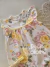 Macaquinho bebê floral amarelo creme Milon 1824 na internet