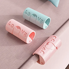 SUJETA SABANAS DE PLASTICO TRANSPARENTES