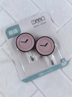 GANCHO ADHESIVO RELOJ en internet
