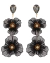 Brinco longo com flores pretas e pedrarias, destacando detalhes em dourado e cristal.