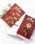 Conjunto de grampos para cabelo dourados com estrelas e detalhes em strass.